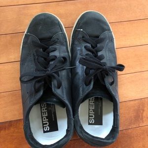 Golden Goose black perforated superstar sneaker